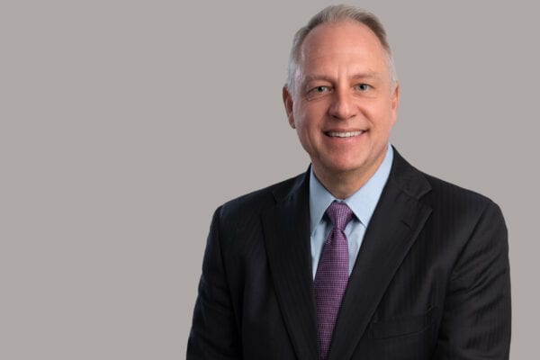 Mark D. Collins, Director