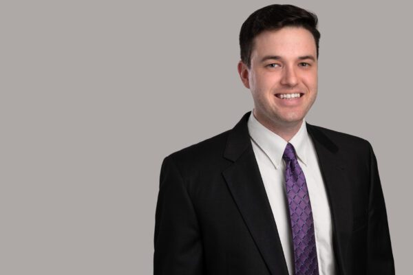 Timothy F. Mangan, Associate