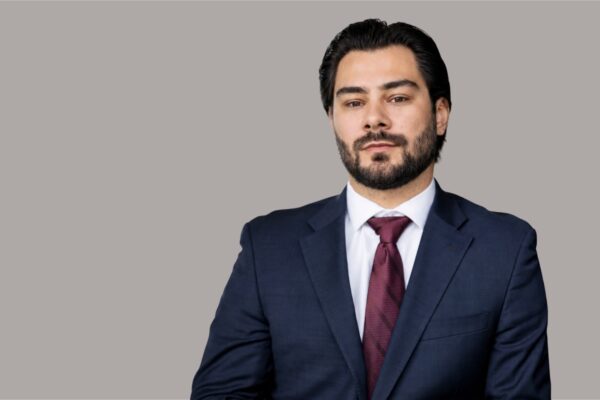 Austin R. Niggebrugge, Associate